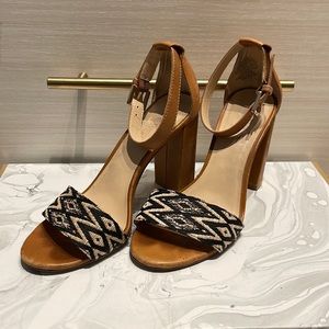 Chunky heal sandal. Perfect little touch of color and print on tan.